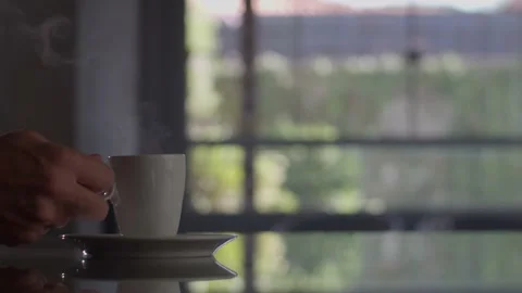 Hand holding coffee cup Stock Footage 199472594