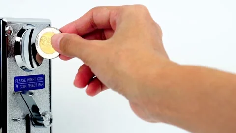 Hand holding a coin, vending machine on a white background. 스톡 동영상 169209564