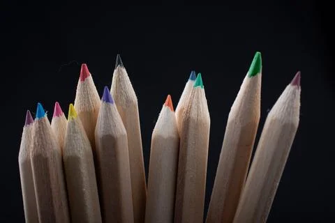 Hand holding colored pencils for creative idea and concept. Stock Photos
