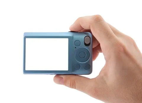 Hand holding compact digital camera. Clipping path included Stock Photos