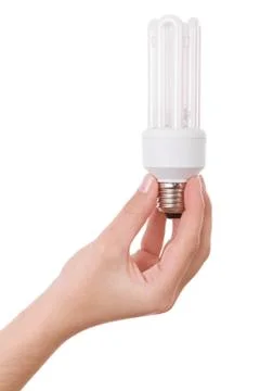 Hand holding compact fluorescent light bulb isolated on white Stock Photos