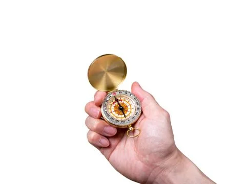 A hand holding a compass Stock Photos