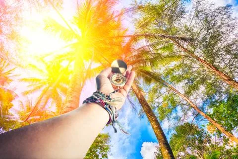 Hand holding compass Stock Photos