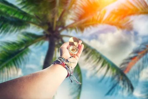 Hand holding compass Stock Photos