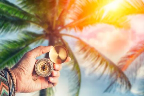 Hand holding compass Stock Photos