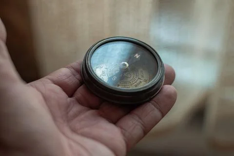 Hand Holding Compass Stock Photos