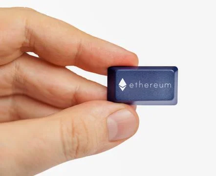 Hand holding computer key with ethereum logo. cryptocurrency concept Stock Illustration