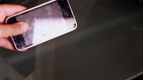 Hand holding cracked smartphone Video stock 41476489
