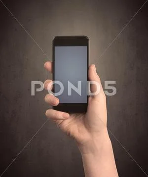 Hand holding device Stock Photos
