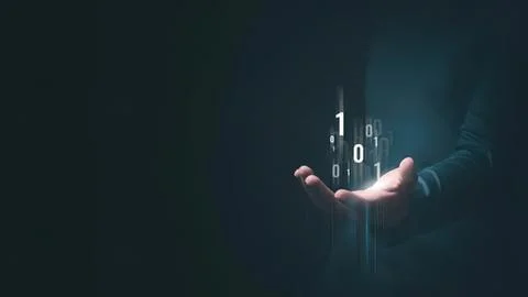 Hand holding digital binary numbers in a dark background Stock Photos