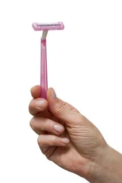 Hand holding a disposable razor Stock Photos
