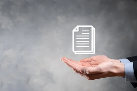 Hand holding a document icon in his hand Document Management Data System Busi Stockfoto's