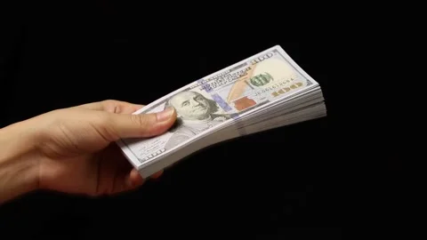 Hand holding dollar bill Stock Footage 226480877