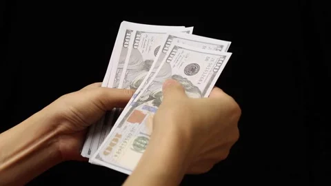 Hand holding dollar bill Stock Footage 226481177