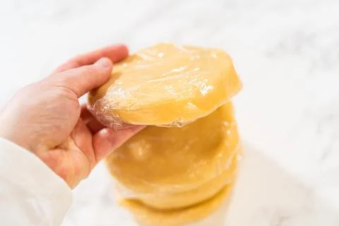 Hand Holding Easter Cookie Dough Disk Stock Photos