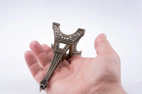 Hand holding the Eiffel tower 스톡 사진