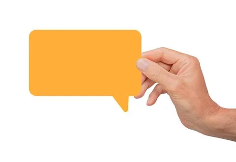Hand holding an empty speech bubble, symbolizing communication and feedback. Stock Photos