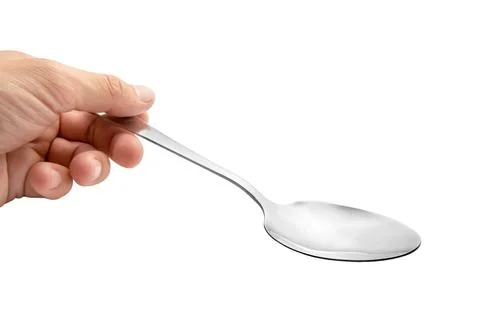 Hand holding empty spoon Stock Photos