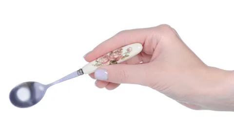 Hand holding empty teaspoon Stock Photos