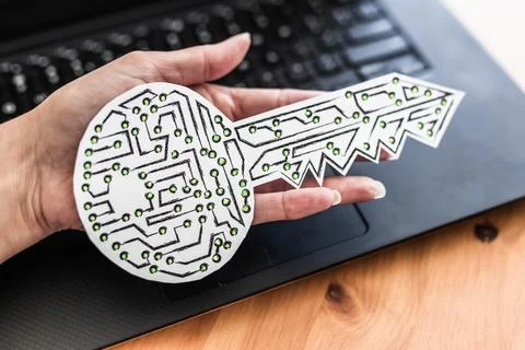 Hand holding encryption key icon made of circuits and LED lights in front o.. Stock Photos