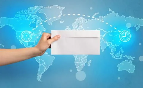 Hand holding envelope with global concept 스톡 사진