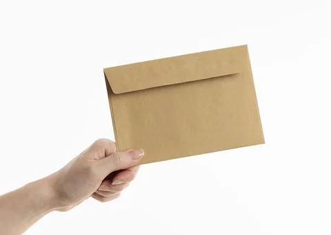 Hand holding envelope Foto stock