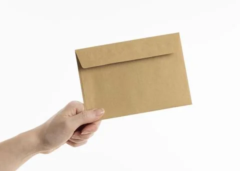 Hand holding envelope Stock Photos