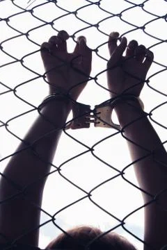 Hand holding fence Stock Photos