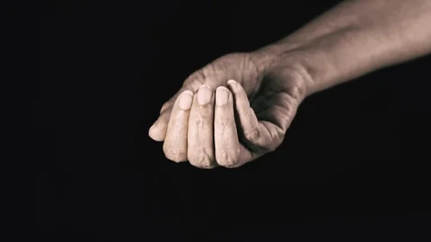 Hand Holding Fresh Coffee Beans, Slow Motion clip on Black Background Stock Footage 107168777