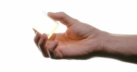 Hand Holding a Glass Cube with Rainbow Refraction Stock Footage 293676092