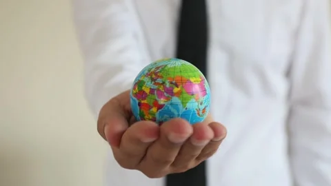 Hand Holding A Globe In Close Up Stock Footage 344913302