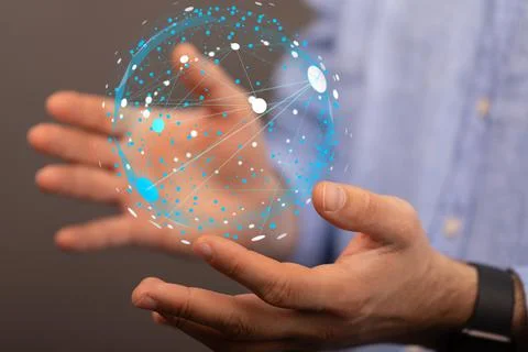 Hand holding a globe - the concept of data network Stock Photos