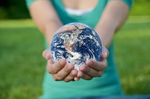 Hand holding a globe. save earth environment Stock Photos