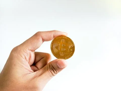 Hand holding gold bars Stock Photos