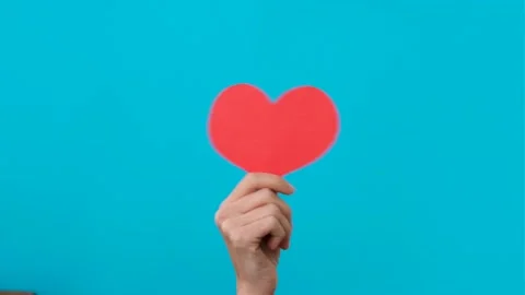 Hand holding heart Stock Footage 144653974