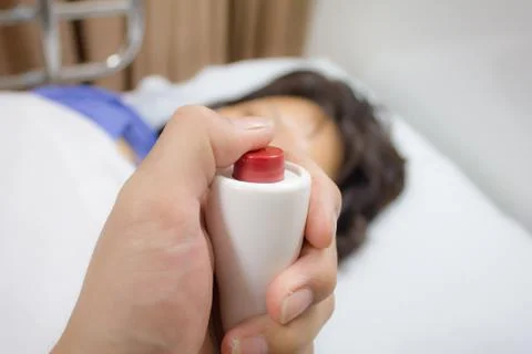 Hand holding a help call button emergency Stock Photos