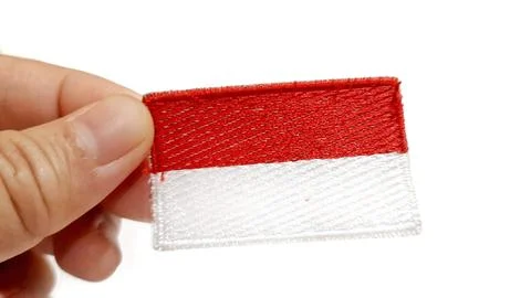 Hand Holding an Indonesian Flag Patch Foto stock