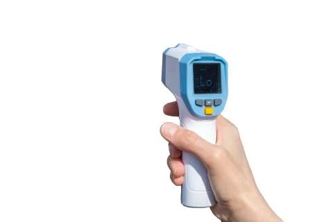 Hand holding infrared laser thermometer Stock Photos