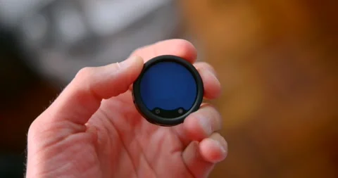 Hand Holding Insta360 Mic Pro E-Ink Display Button Close Up Stock Footage 341328408