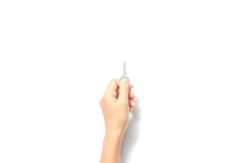 Hand holding key Stock Photos