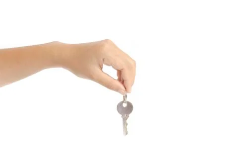 Hand holding key Stock Photos