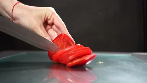 A hand holding a knife Stock Footage 133646496