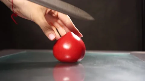 A hand holding a knife Stock Footage 133646578