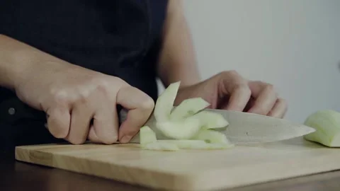 A hand holding a knife 库存影片 157873048