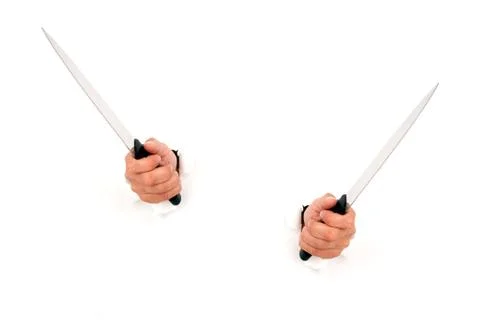 Hand holding a knife Stock Photos