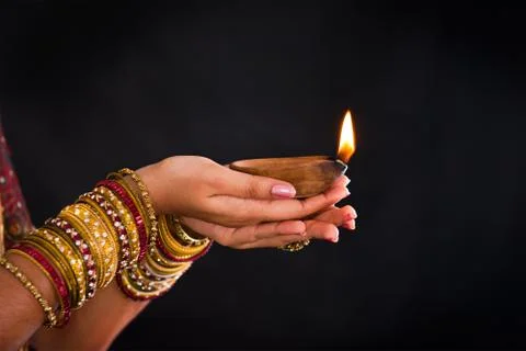 Hand holding lantern during diwali festival of lights Stock Photos