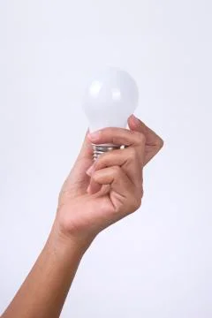 Hand Holding Light Bulb Stock Photos
