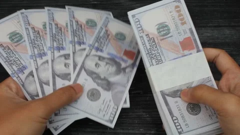Hand holding a lot of money Stock Footage 309898053