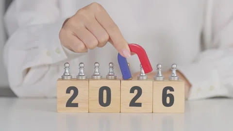 Hand holding magnet and pulling man chess figure from the crowd employee wi.. Stock Footage 316821104