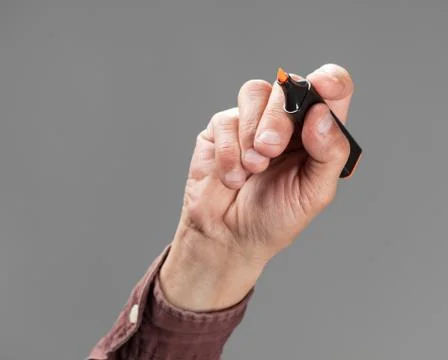 Hand holding marker Stock Photos